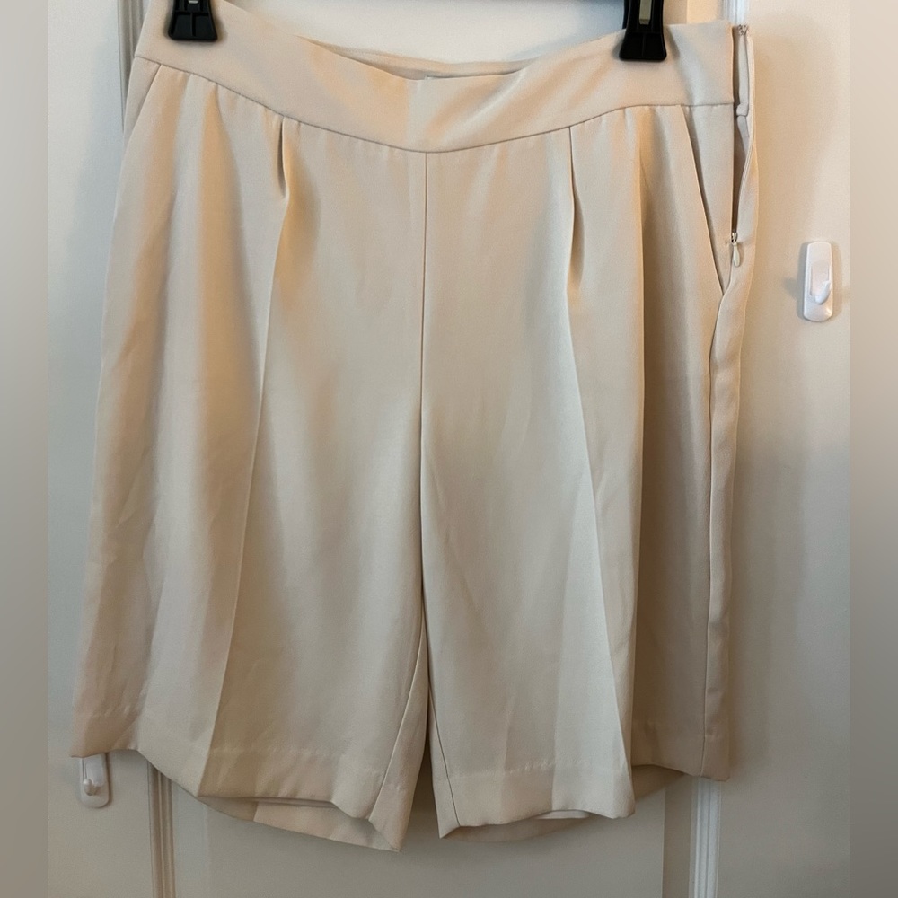 DKNY walking shorts in a cream color.  Beautiful, never worn.